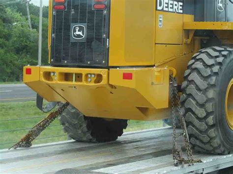 what size chain to tie down skid steer|tie down chain repair.